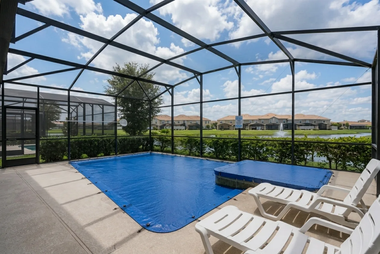Illustrative render of a blue pool cover fitted around a pool and spa